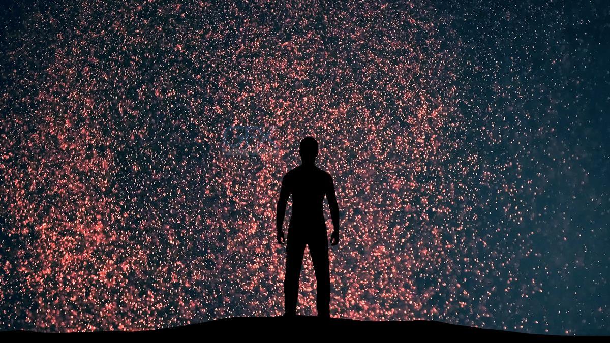 عکس مرد روی ذرات درخشان – Man on Shimmering Particles